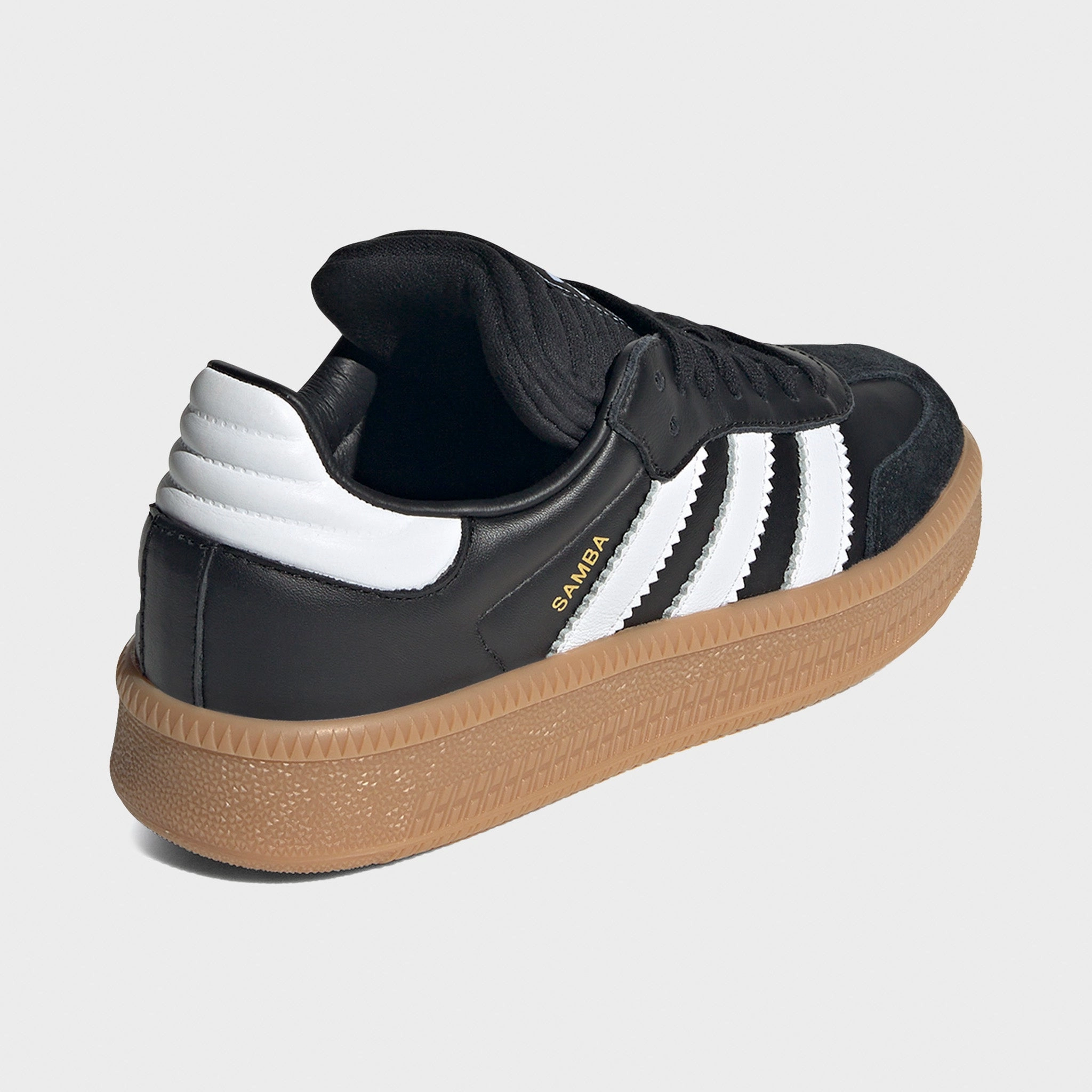 Hexagonal Lug Pattern Grip Enhancing Pattern adidas Juniors' Samba XLG Core Black / Footwear White - Gum