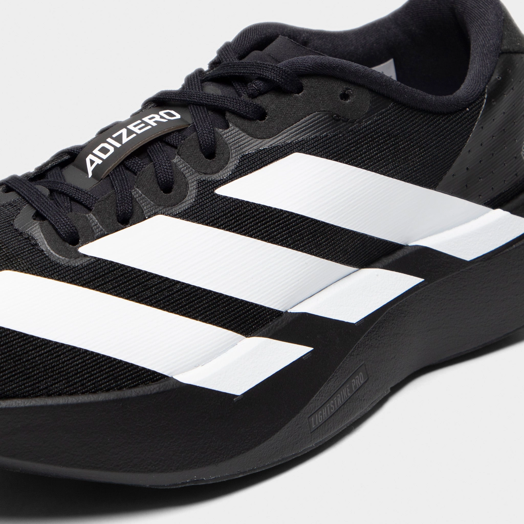adidas Junior's Adizero Evo SL Black / White - Carbon Ventilation Endurance Sole