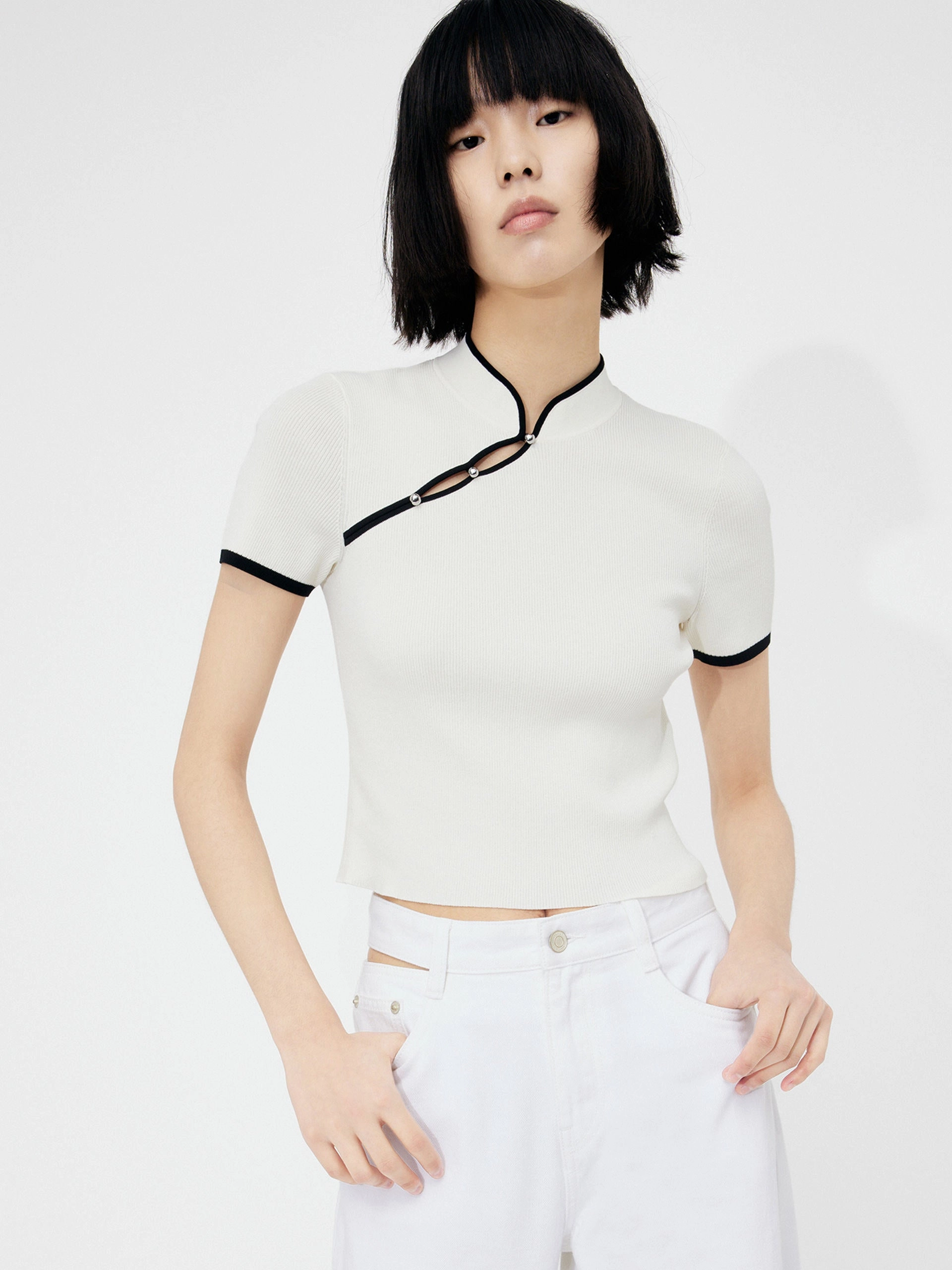 ReflectiveDetails LightweightTexture Slanted Placket Knit Top
