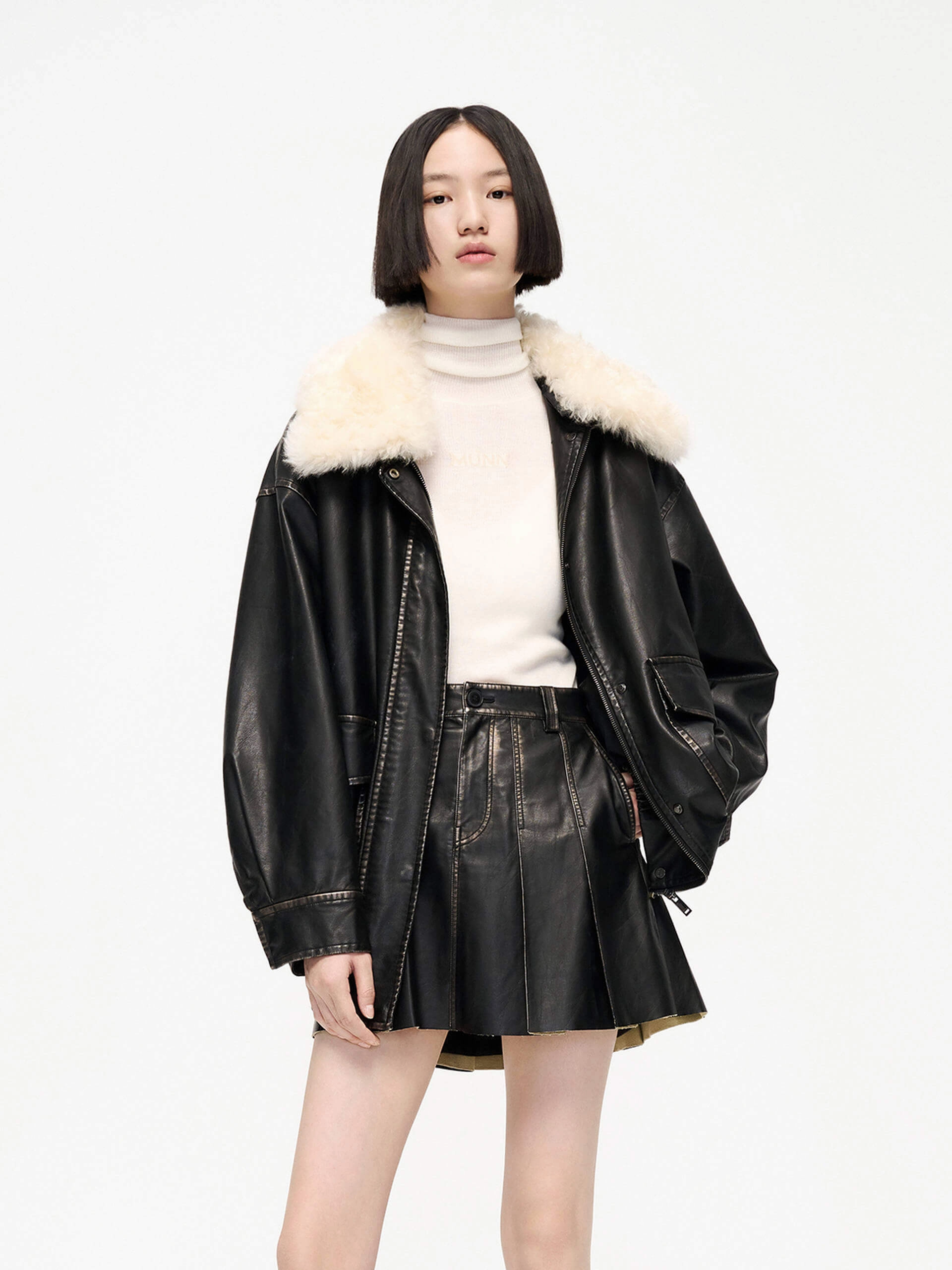 Fuzzy Collar PU Leather Jacket Seamless Design Double Layered Hood Assembly