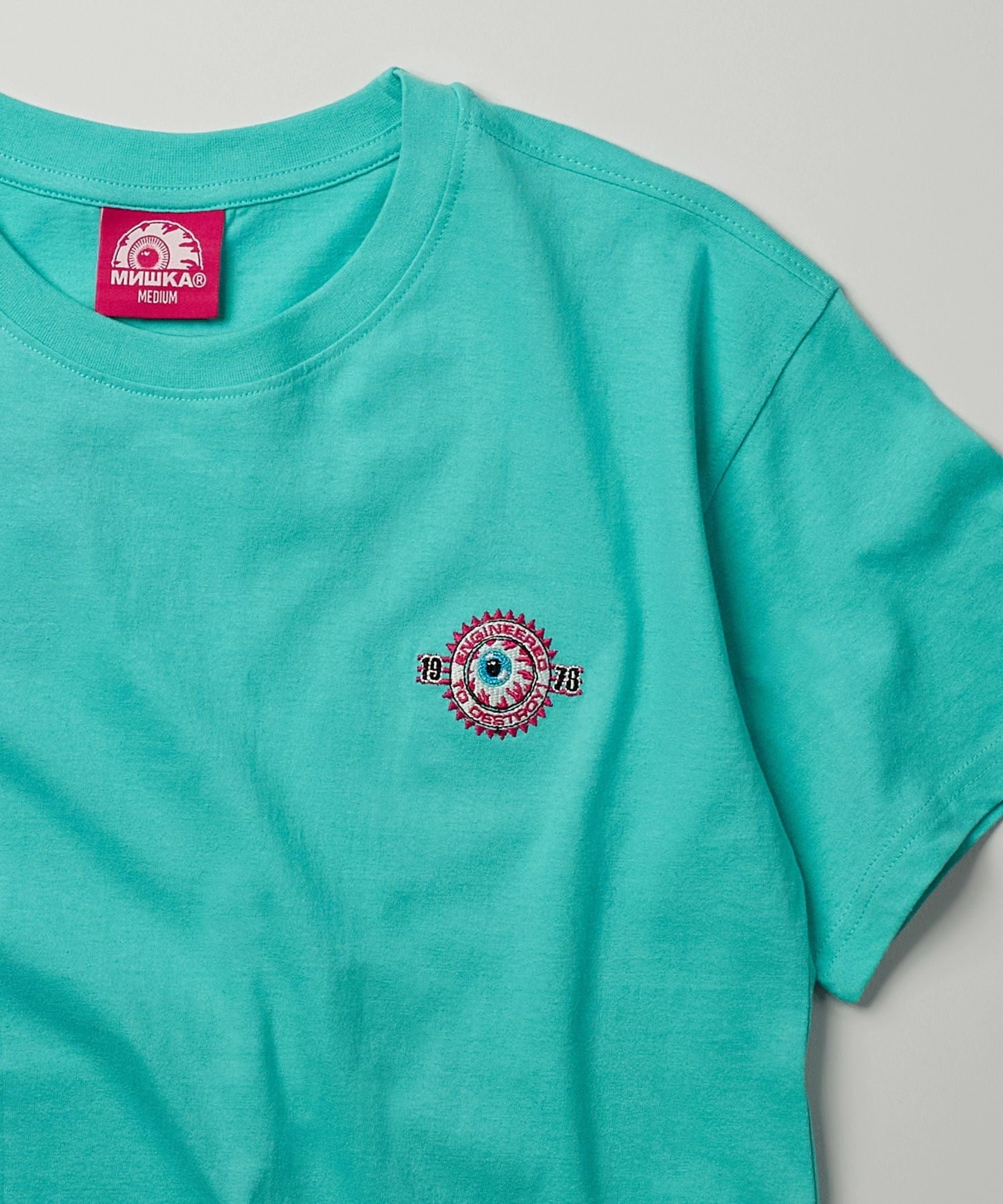 Mishka Death Adders Embroidered Short Sleeve Tee - Light Blue HeatPressedLogos Reflective Trim Details