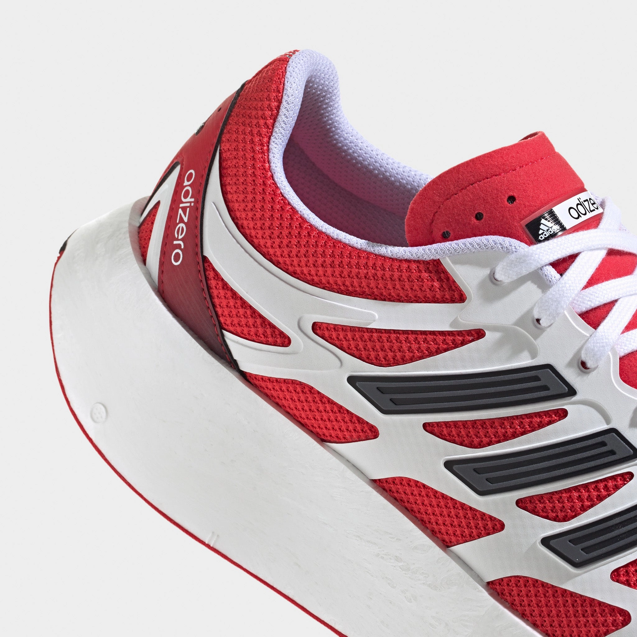 adidas Adizero Aruku Footwear White / Pure Ruby - Core Black High Density Foam Layer